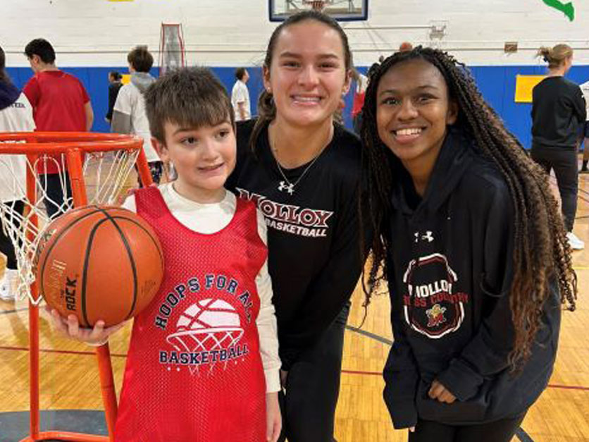 Molloy University students at a basketball event