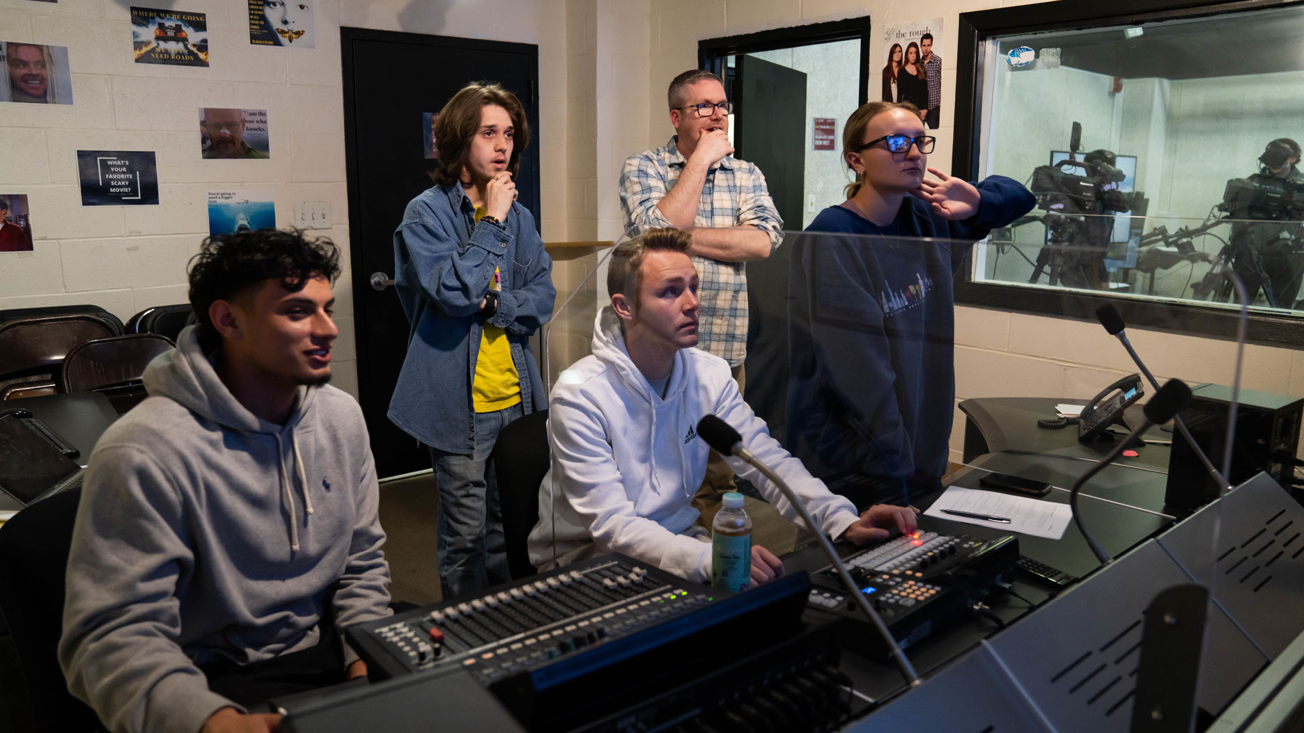 Professor Tom Kenny with students in studio