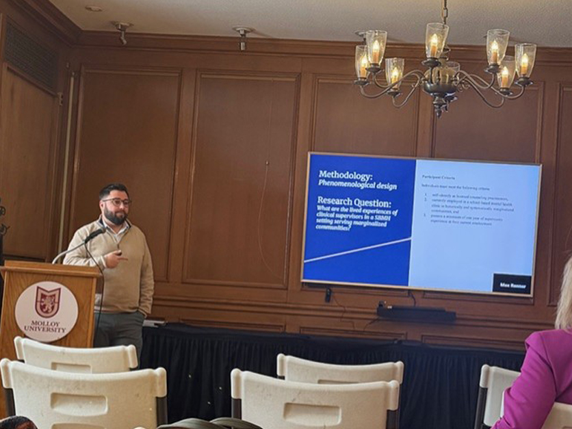 Dr. Blanchard presenting at Faculty Research Day 2026