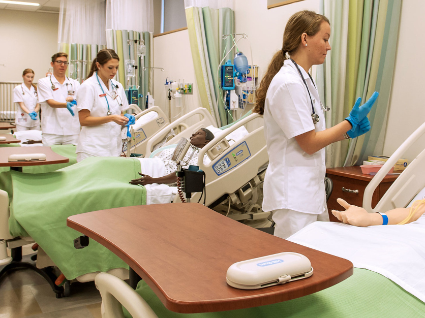 Students in the nursing simulation lab at Molloy University