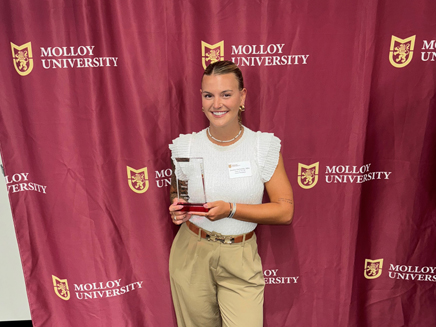 Alumni receives her 30/30 award