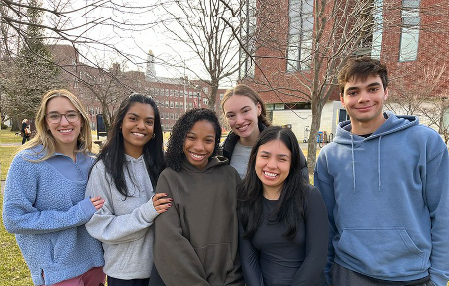 Molloy University students huddled in front of Public Square