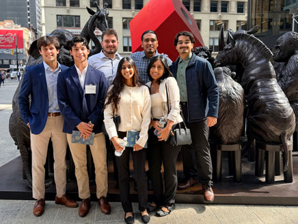 Business students at the New York Stock Exchange (NYSE) and Federal Reserve Bank of New York. 