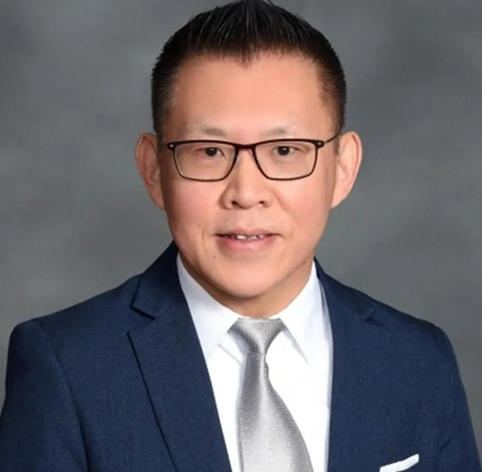 Alexander Chan, professor, Molloy University 