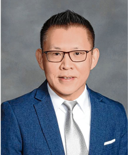 Professor Alexander Chan, an assistant professor in Molloy University’s School of Business