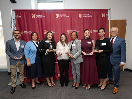 Alumni association awards featuring President Lentini and awardees