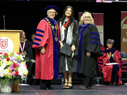Molloy University 2025 Salutatorian Anna Nugent with President James Lentini and Vice President for Academic Affairs Michelle Piskulich