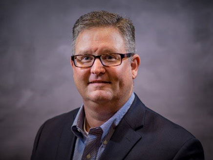 Headshot of Brian McNeill, CFO and Treasurer