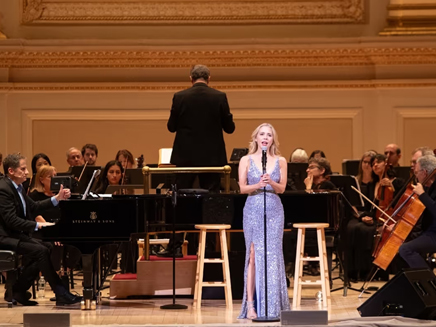 Kerry Butler singing at Carnegie hall performing alongside orchestra 