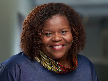 Headshot of Dr. Lisa Zakiya Newland, a Molloy University Professor and Chair of the University’s Social Work Department