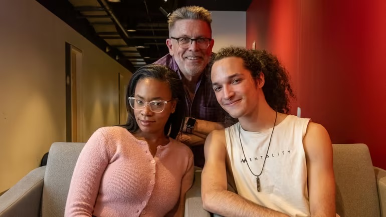 Theatre Arts director of Molly University Chris O'Connor, standing, with students Taneka Tucker, left, and Elijah Martinez.