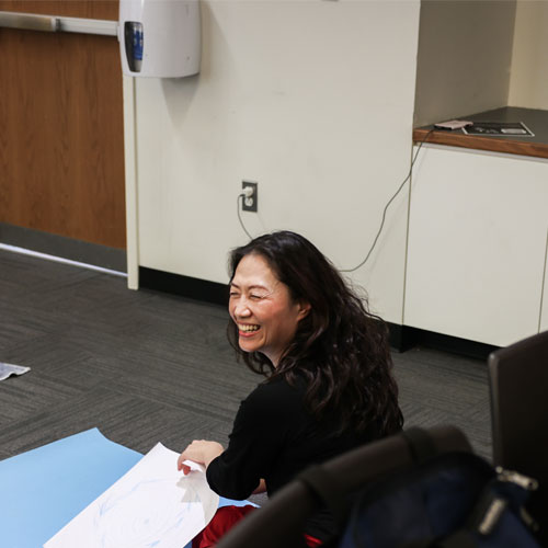 Student smiling in class