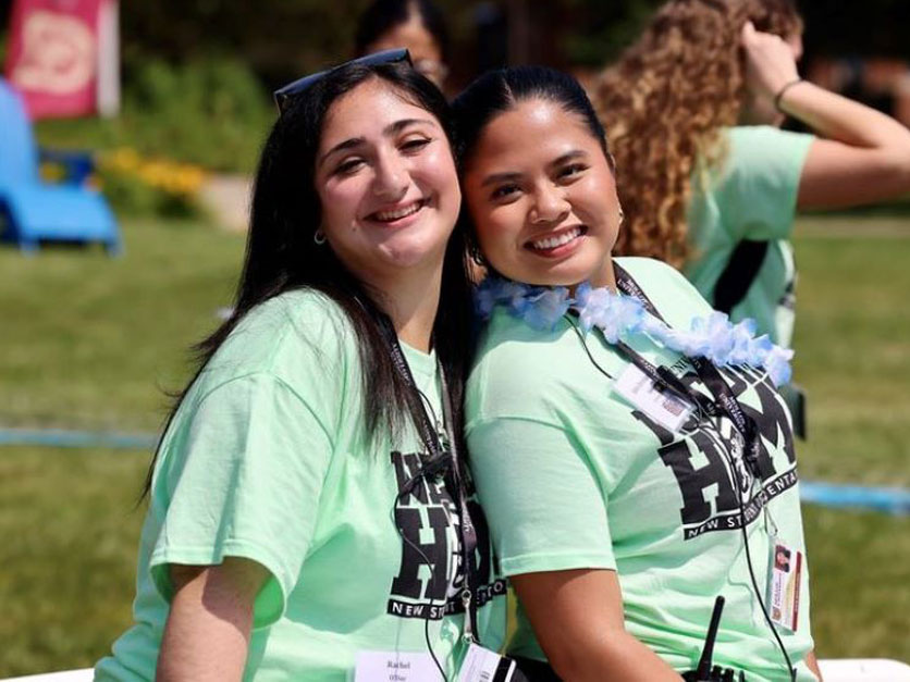 Student Orientation Leaders smiling on campus