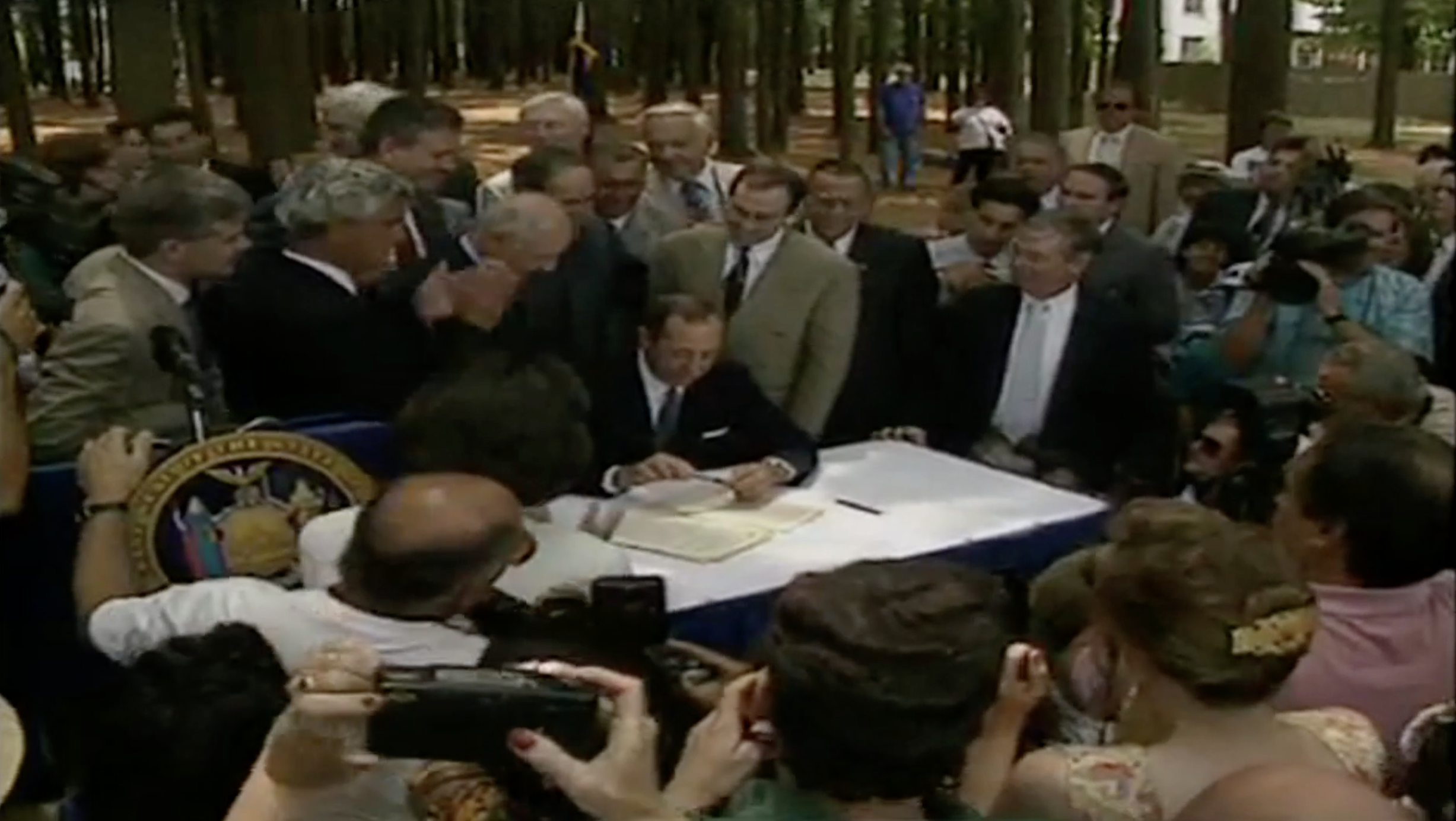 Photo of Governor Mario Cuomo signing Pine Barrens law
