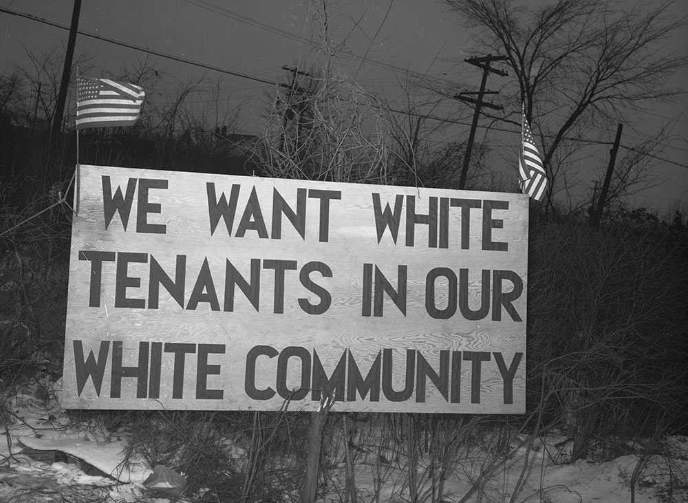 Photo of sign reading "We Want White Tenants in Our White Community"