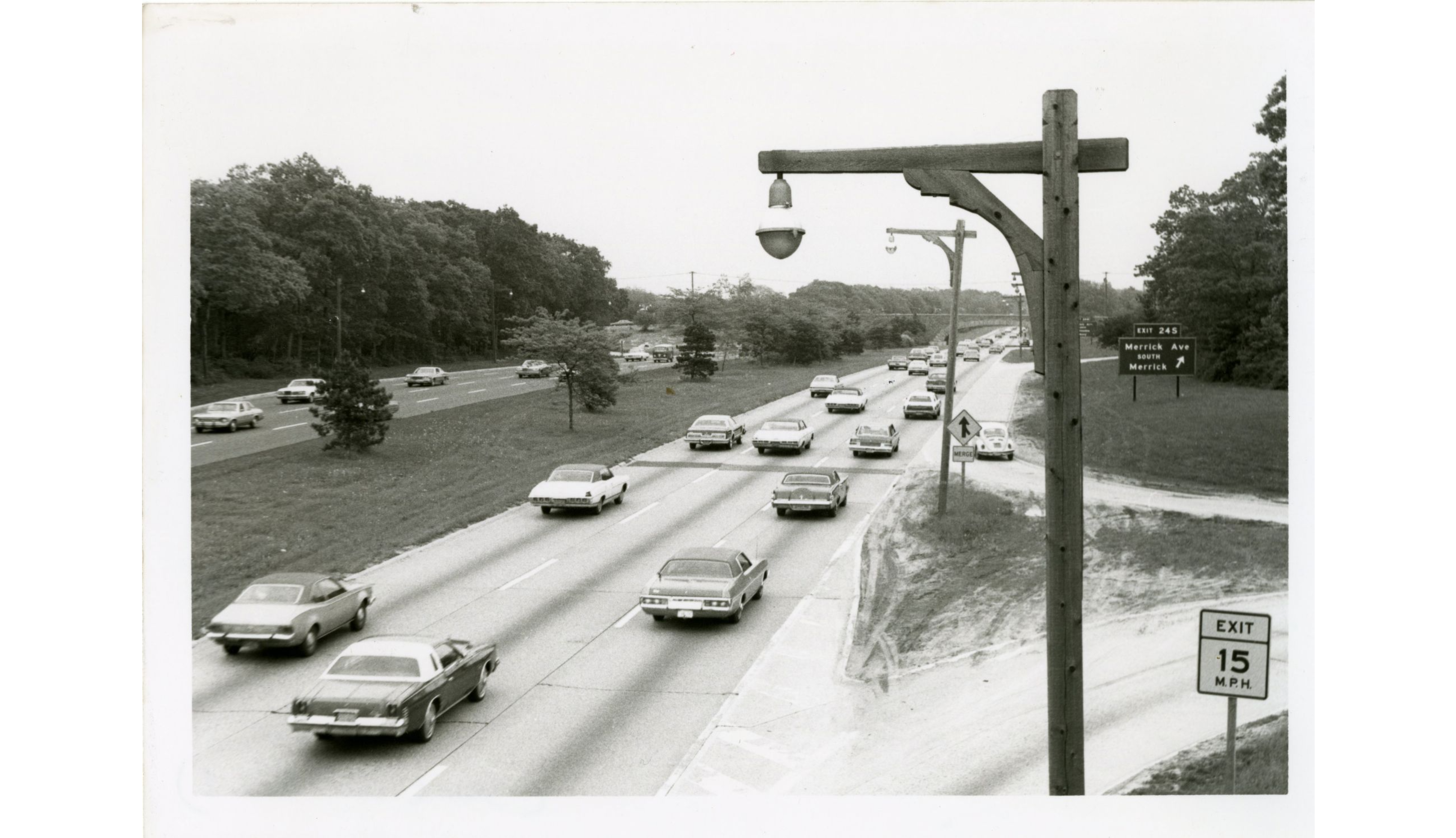 Photo of Southern State Parkway with wooden light poles (probably from the 70s)