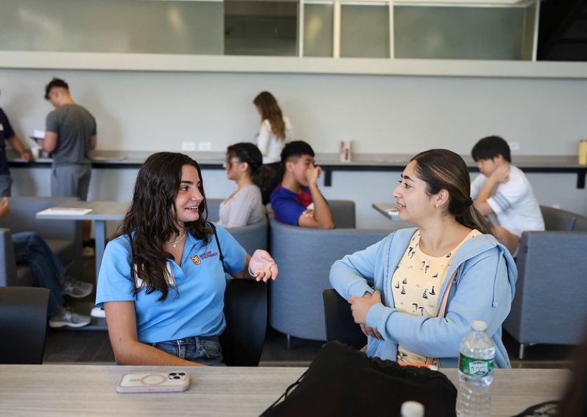 students chatting at orientation