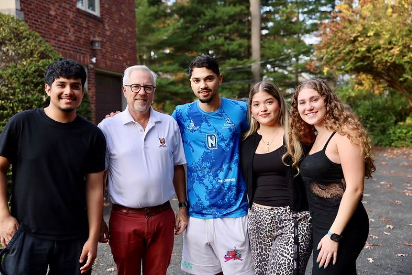 President Lentini with students during Halloween